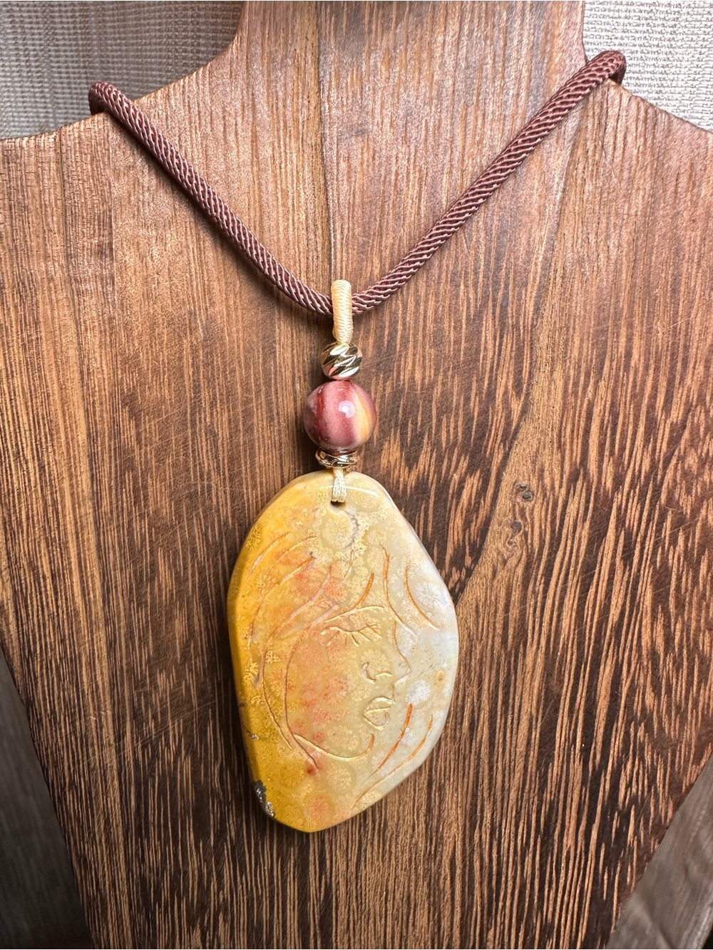 Coral Fossil Lady Profile Pendant Necklace on Brown Rope - Picture 2 of 14